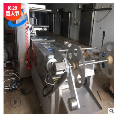 出售二手海參單裝連續(xù)式拉伸膜真空包裝機(jī) 大型食品包裝設(shè)備